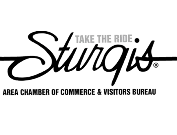 Black and white logo with the words “TAKE THE RIDE Sturgis AREA CHAMBER OF COMMERCE & VISITORS BUREAU” in stylized fonts.